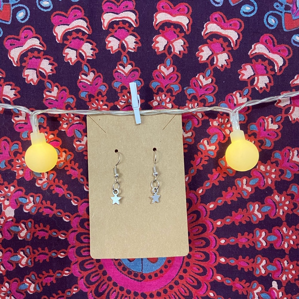 Dangle small silver star earrings